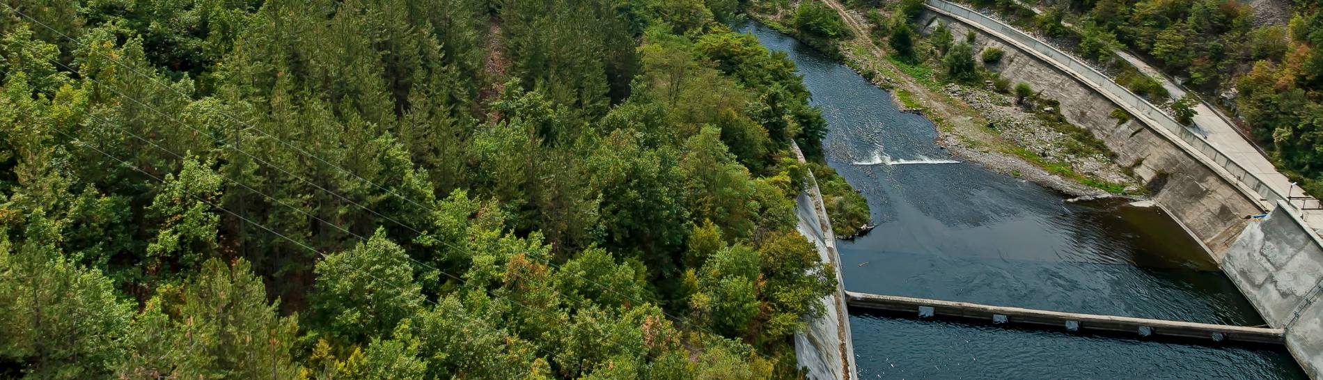 View of the old small hydro power plant and Topolnitsa dam  on t